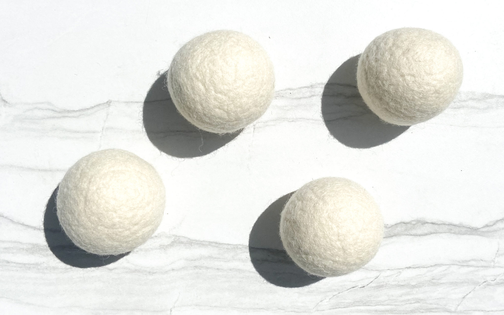 four wool dryer balls